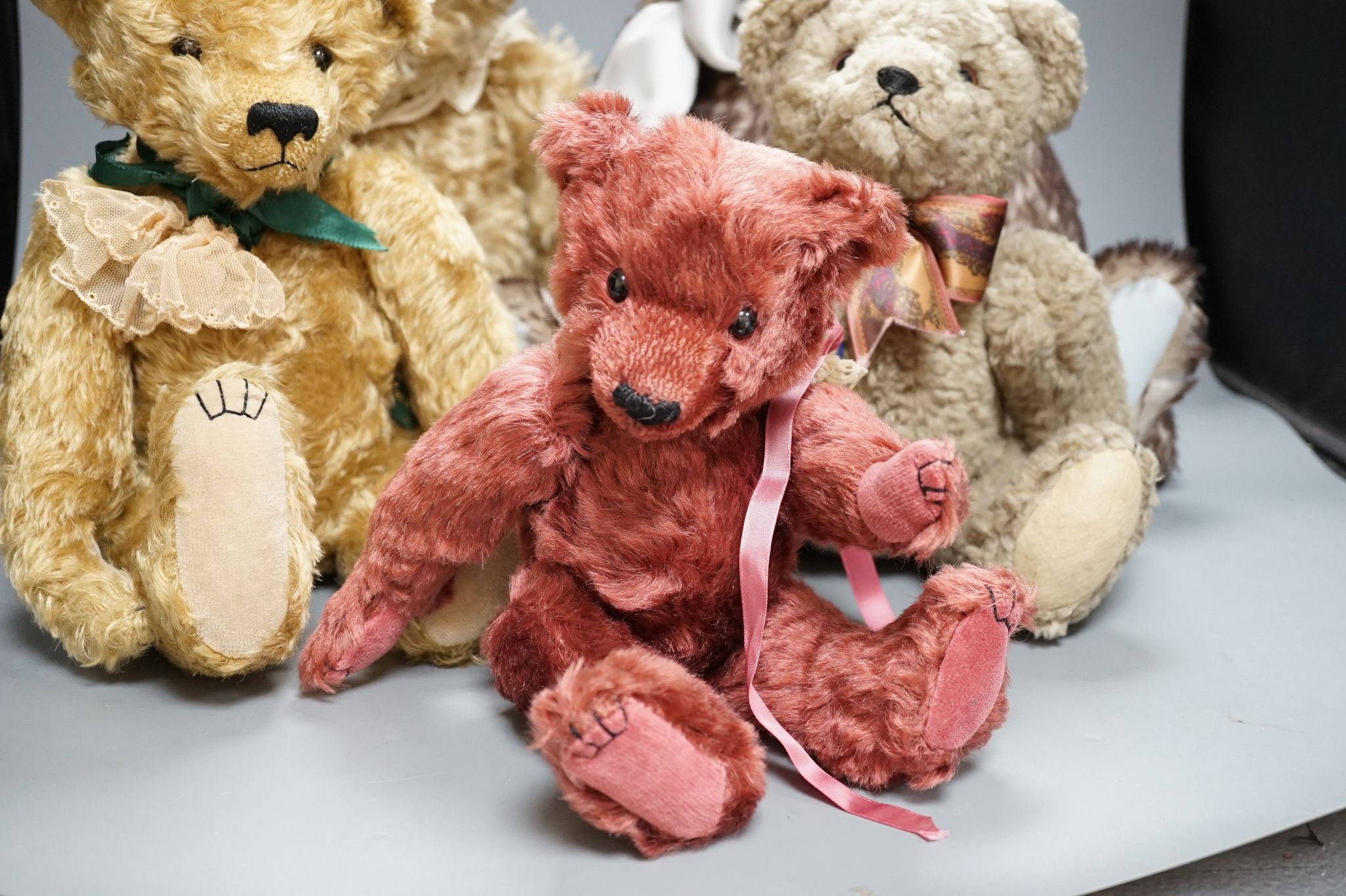 Four Pam Howells bears and one Clements bear